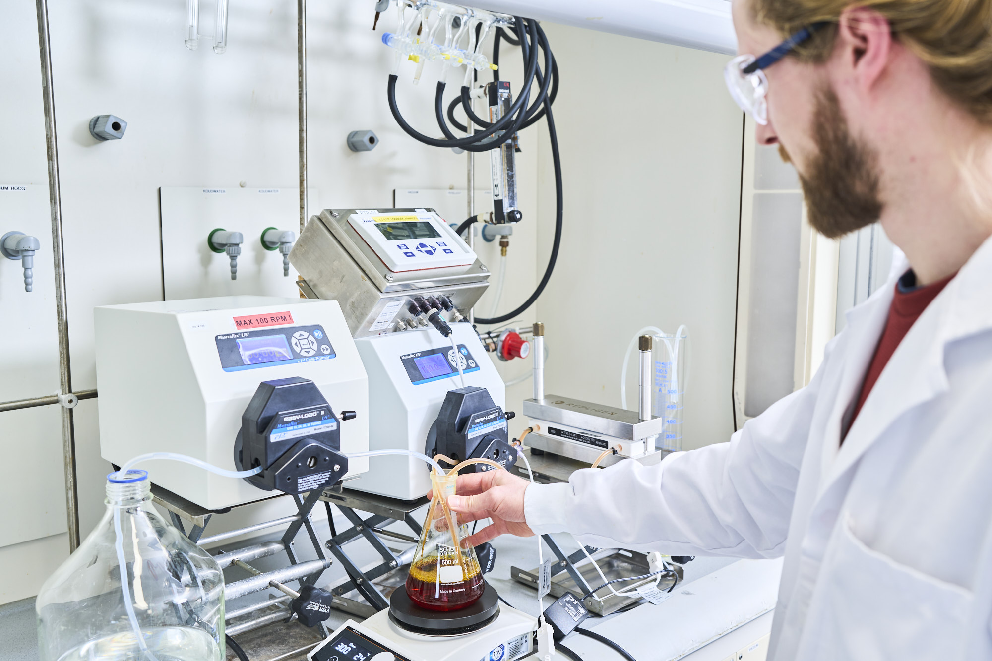 Ardena scientist working in polymeric nanoparticle development laboratory